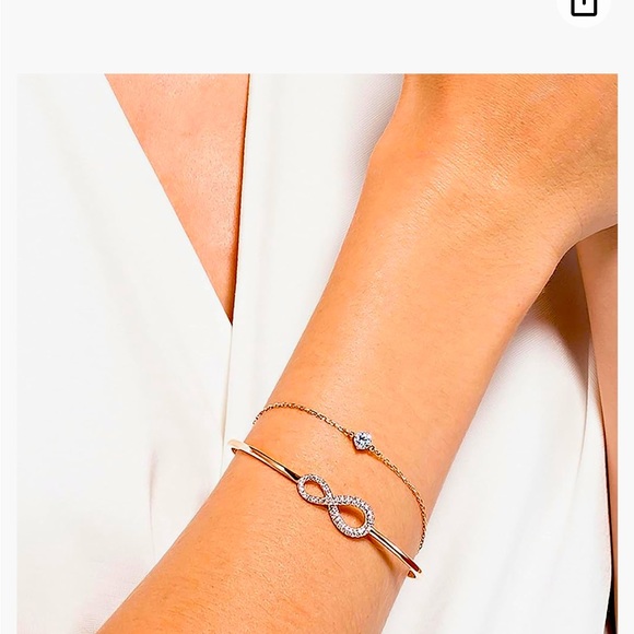 SWAROVSKI Infinity Twist Bracelet, Rose Gold Tone Finish, Clear Crystals - Picture 1 of 5